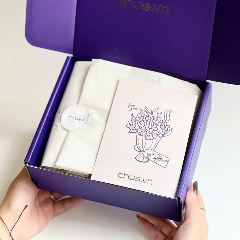 Feminine silk gift box featuring exclusive Vietnamese silk eye mask, hair tie and scarf set, creating gentle moments as perfect birthday gift for her