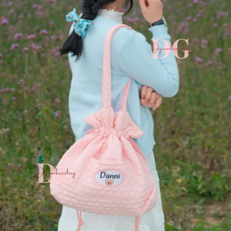 Personalized embroidered quilted bag enchanted by rare adorable beauty, featuring a cute drawstring pouch design as a unique accessory for personalized birthday gifts.Personalized embroidered quilted bag enchanted by rare adorable beauty, featuring a cute drawstring pouch design as a unique accessory for personalized birthday gifts.