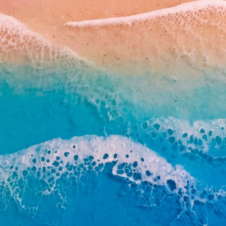 Smooth epoxy resin art measuring 30 x 30cm captures gentle ocean beauty through 3D epoxy resin seascape techniques, creating handcrafted wall art perfect as meaningful housewarming gift.
