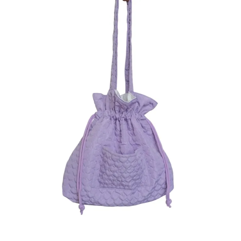 Personalized embroidered quilted bag enchanted by rare adorable beauty, featuring a cute drawstring pouch design as a unique accessory for personalized birthday gifts.