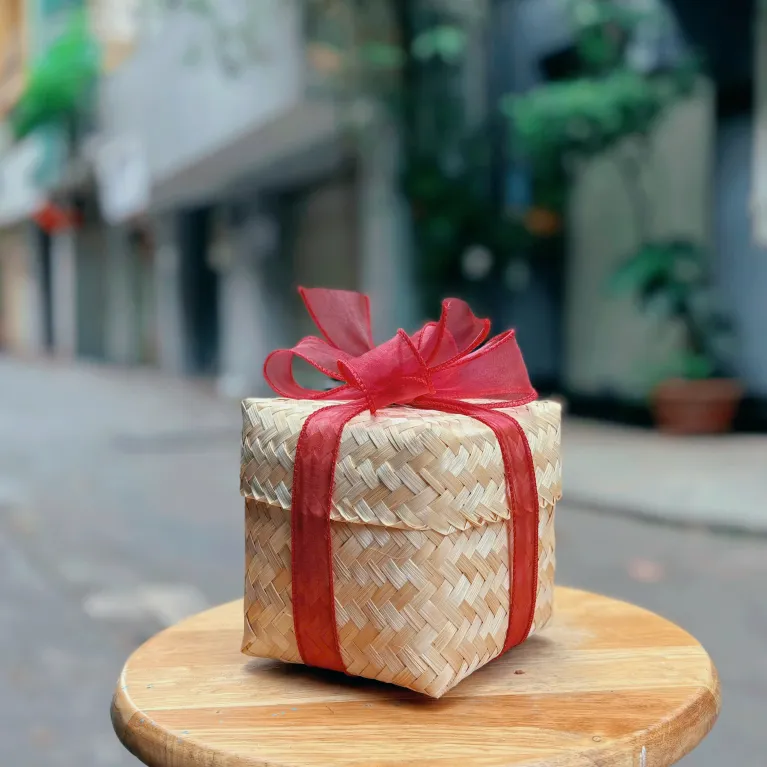 Sliced ginger candy bamboo gift box 350gr with natural refined flavor, featuring cold relief ginger as healthy candy making a perfect gift for family and Vietnamese specialty gift