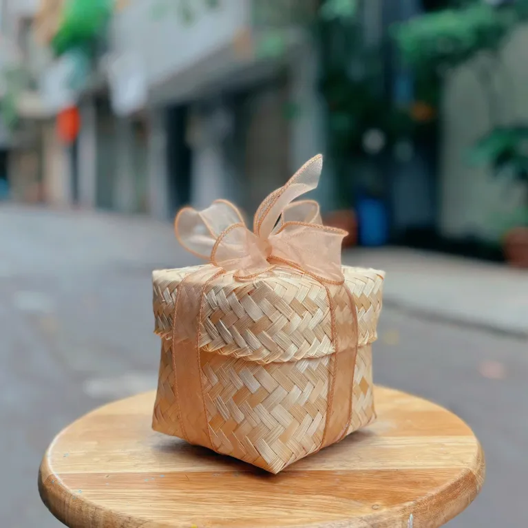 Sliced ginger candy bamboo gift box 350gr with natural refined flavor, featuring cold relief ginger as healthy candy making a perfect gift for family and Vietnamese specialty gift