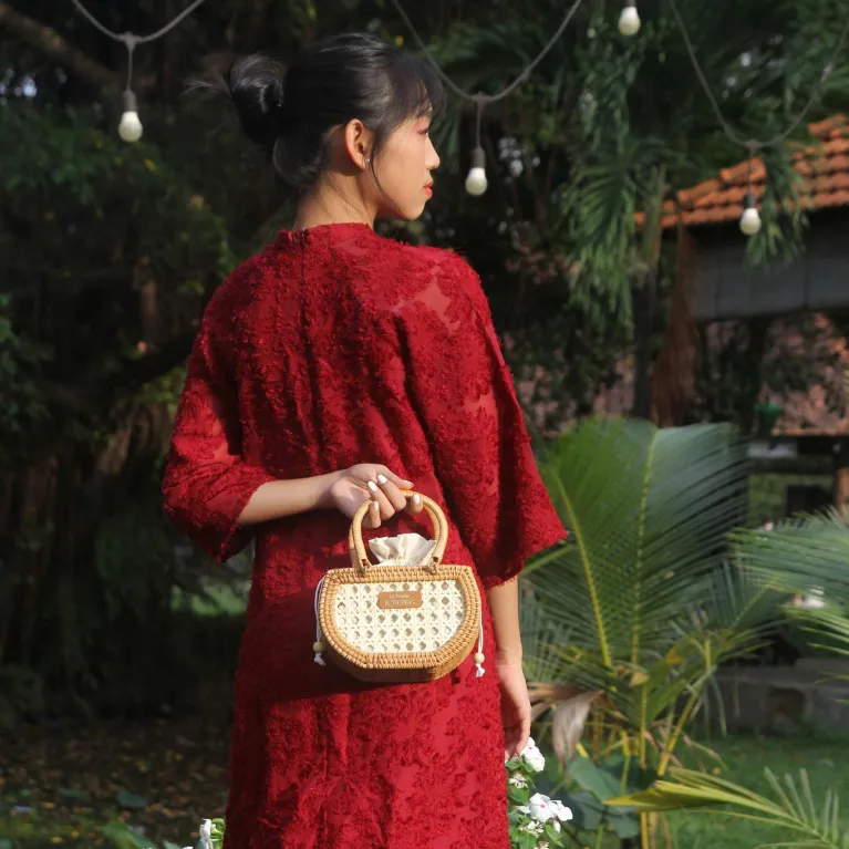 Mini Petal Woven rattan handbag compact embracing pure essence, handcrafted compact handbag sustainable fashion as Vietnamese souvenirs