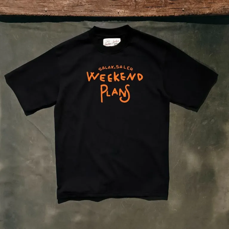 "Weekend Plans" cotton T-shirt with energetic graphics, celebrating your own time and space - designer streetwear with unique style, perfect as a birthday gift or Vietnamese souvenir