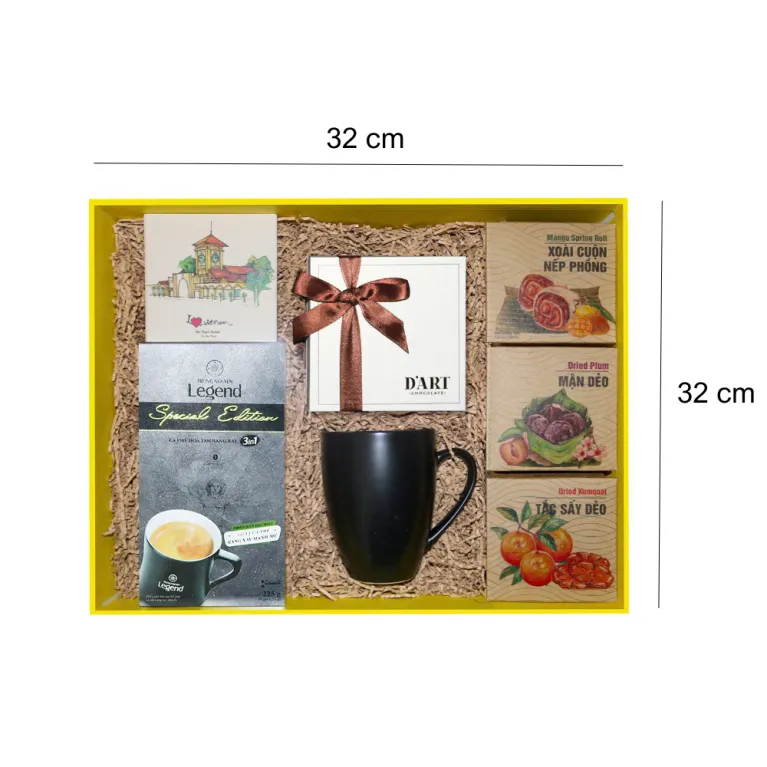 The "Viet Heritage" gift box captures the essence of Vietnam with coffee, elegant cups, and dried fruits – a premium specialty gift for corporate occasions.
