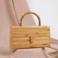 box shaped bamboo handbag, inspired by treasure chests, 100% bamboo material, unique and eye-catching accessory