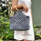 grey-blue macrame bag with wooden handle, diamond-shaped pattern, neutral gray tone, easy to match with any outfit