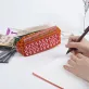 brocade pen bag, red and cream, secure stitching, spacious pocket compartment, sturdy structure, unique pattern design.