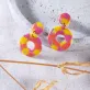 circle of life clay earrings, each color segment is pieced together with shimmering metallic edges, meaningful gift for friends