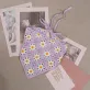 daisy crochet bandana, vibrant colors, adorable daisy pattern, gentle and pure design, vintage style