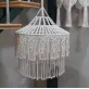 macrame chandelier, elegant and luxurious design, high aesthetic value, handcrafted product, interior decoration
