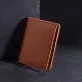 three-compartment vachetta leather card holder with button, simple folding design, compact and convenient form