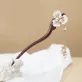 flower tassel wooden hair stick, meticulously handcrafted, soft and elegant lines, high durability, sophisticated hair accessory