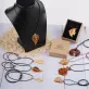 wooden pendant necklace, intricately crafted, various designs, durable wood material, high durability, unique handcrafted accessory