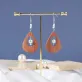 big teardrop wooden earrings, elegant and luxurious design, enhances facial features, easy to match with outfits, high durability