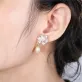 “cúc ngọc” silver earrings with freshwater pearl, elegant daisy pattern, sophisticated beauty, subtle accent for outfits, stylish design