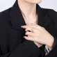 “an” moonstone silver ring, delicate appearance, contemporary design, enhancing the beauty of the hand, natural moonstone