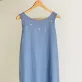 linen bow dress with floral embroidery, soft two-layered fabric, handcrafted embroidery patterns, exquisitely sewn lines