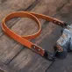 vachetta leather camera strap, flexible and durable material, rustic style, simple strap design, retro style