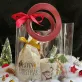 The "A Bag of Joy" Christmas Gift Set, bursting with youthful fun, is a transparent gift basket featuring a ceramic mug, cocoa, and marshmallows, making it a unique Christmas gift perfect for spreading holiday cheer