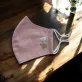 The Wild Daisy Embroidery Linen Face Mask combines elegance and functionality, offering a touch of serenity to each day with its 3-ply design, adjustable straps, and commitment to sustainability as an eco-friendly accessory