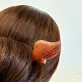 The Traditional Wooden Leaf Hair Stick is a timeless handmade hair accessory that beautifully embraces classic elegance, making it a perfect traditional accessory to elevate any hairstyle - an ideal gift for her or a heartfelt gift for mom