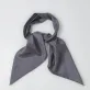This Grey Silk Square Scarf, a traditionally woven and handcrafted Vietnamese accessory made from natural silk, offers a subtle yet luxurious look, making it a thoughtful gift for her