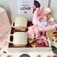 The "Love Endlessly" Valentine Gift Box is a heartfelt Valentine's gift set designed to nurture and celebrate enduring romance, featuring a charming mug, elegant spoon, and a delicate scrunchies bouquet—the perfect gift for your girlfriend this Valentine's Day.