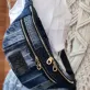 Túi Đeo Chéo Trước Ngực Hai Khóa Từ Jeans Tái Chế là phụ kiện tiện dụng & ý nghĩa, lý tưởng cho tín đồ thời trang bền vững, đồng thời là món quà sinh nhật sáng tạo và quà tặng xanh đầy cảm hứng.