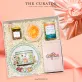"Beauty Glow" gift box – pink gift for the elegant lady featuring a cup and saucer, saffron, honey, and scented candle, perfect gift for her on Women's Day.