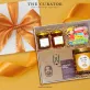 Hộp quà "Sweet Memory" trao tinh hoa từ đất Việt với set quà trà kèm hạt điều cùng mật ong và nam châm lưu niệm, là hộp quà tặng tinh tế chứa đặc sản Việt Nam.