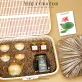 "An Lac" gift box captivates through every detail featuring an elegant brown-themed gift set with a traditional teapot along with premium cordyceps and pure honey, all beautifully presented in a handcrafted bamboo rattan gift box.