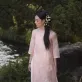 “Garden” Ao Dai paired with wide-leg pants, featuring delicate floral embroidery – a graceful Vietnamese traditional costume and thoughtful souvenir.“Garden” Ao Dai paired with wide-leg pants, featuring delicate floral embroidery – a graceful Vietnamese traditional costume and thoughtful souvenir.