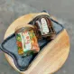 Candied pomelo pith and honey kumquat gift box delivers rich authentic flavors in traditional checkered scarf-wrapped packaging, offering Vietnamese specialty treats as healthy snacks and wellness gifts