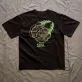 The "Here To Hear" cotton T-shirt connects nature and time with a creative design and comfortable fabric, perfect for travel, adventures, or as a birthday gift.