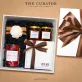 Sweet Time gift box featuring a scented candle, honey, and chocolate, delivering layers of sweet, refined flavors; a perfect Vietnamese specialty and premium corporate gift.