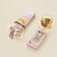 Vietnam Flower Tea combines green tea with blooming flowers in a beautifully packaged set, making it a unique souvenir and convenient specialty gift from Vietnam.