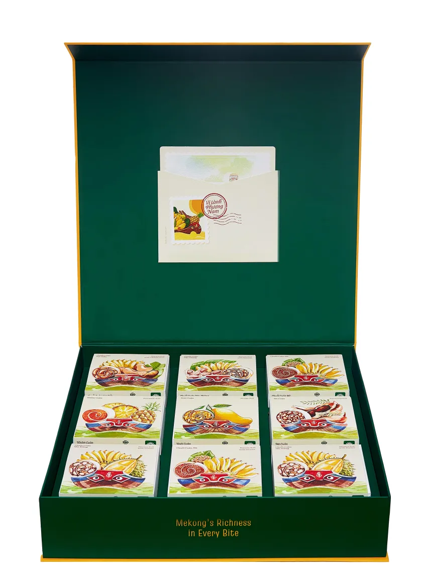 "Gathering" Gift Box brings together 9 premium Vietnamese fruit snacks, capturing the flavors of the Mekong Delta as a heartfelt and elegant gift. "Gathering" Gift Box brings together 9 premium Vietnamese fruit snacks, capturing the flavors of the Mekong Delta as a heartfelt and elegant gift.