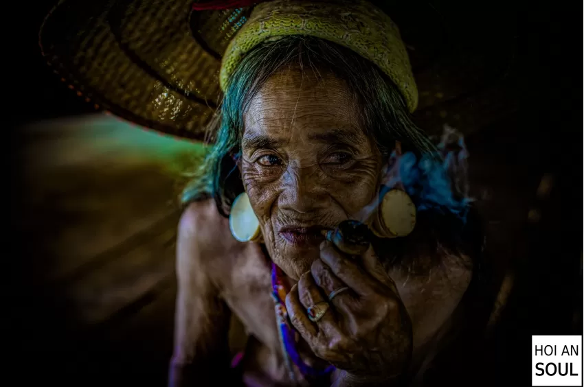 “Smoking Pipe” Photograph, Portrait Photo Of A Woman From An Ethnic Minority, With Realistic, Strong, And Vivid Features