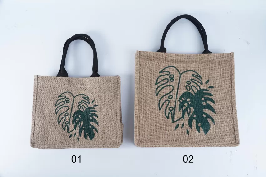 Leaf Jute Bag, Tropical Print, Rustic Canvas Material, Spacious Compartment, Easy to Maintain, Sturdy Leather Straps.