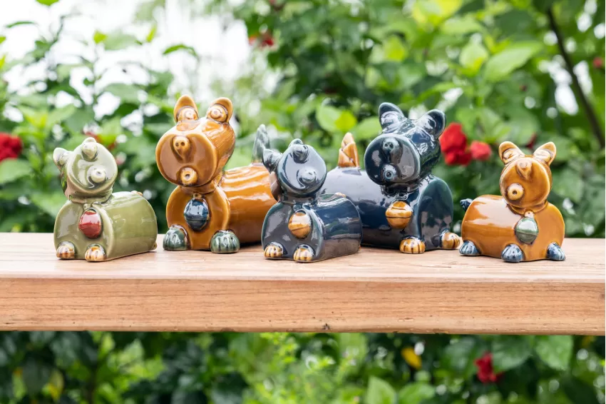 A Family Of Dog Ceramic Figurine Set