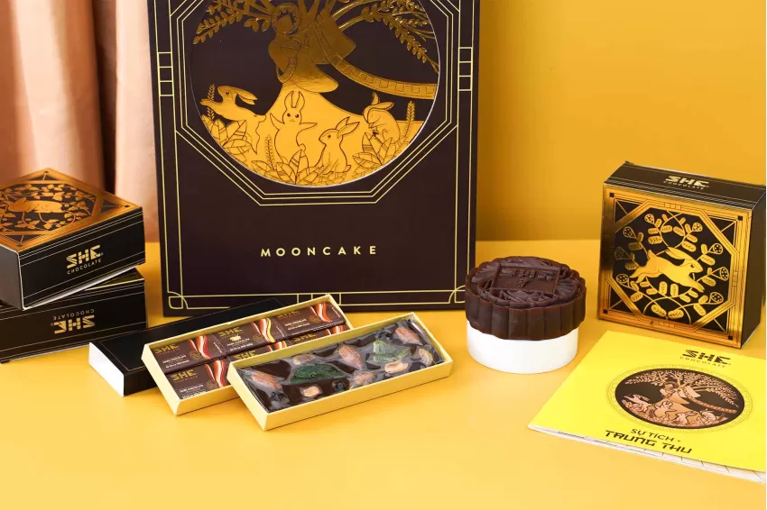 Brown Moon Palace gift box with 3 chocolate mooncakes, 12 chocolate bars & fairy tale booklet, unique corporate Mid-Autumn gift. Brown Moon Palace gift box with 3 chocolate mooncakes, 12 chocolate bars & fairy tale booklet, unique corporate Mid-Autumn gift.