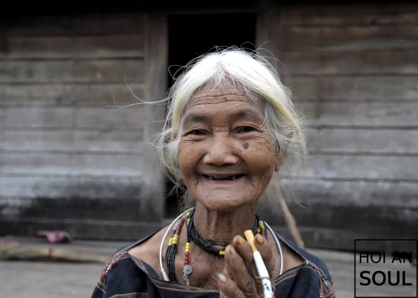 “Smoking Old Lady” Photograph, Portrait Of An Elderly Woman From The Ede Ethnic Group, The Traditional Beauty Of Ethnic Minorities