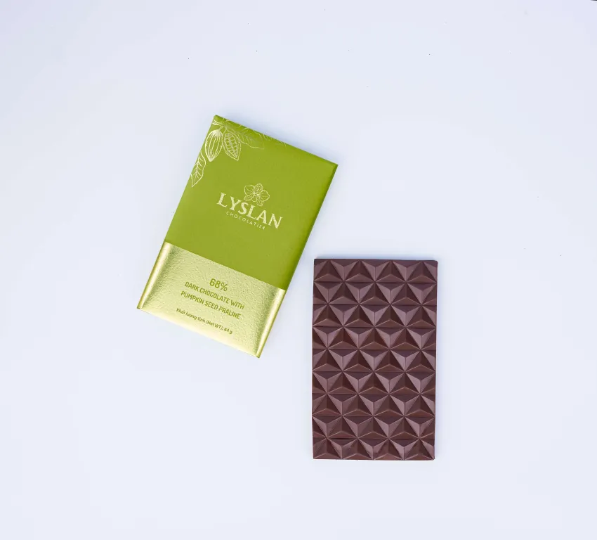 Dark chocolate with pumpkin seeds praline 68% 64gr delivers bold flavor from the delta plains, featuring rich dark chocolate as authentic Mekong Delta chocolate and Vietnamese specialty gift Dark chocolate with pumpkin seeds praline 68% 64gr delivers bold flavor from the delta plains, featuring rich dark chocolate as authentic Mekong Delta chocolate and Vietnamese specialty gift