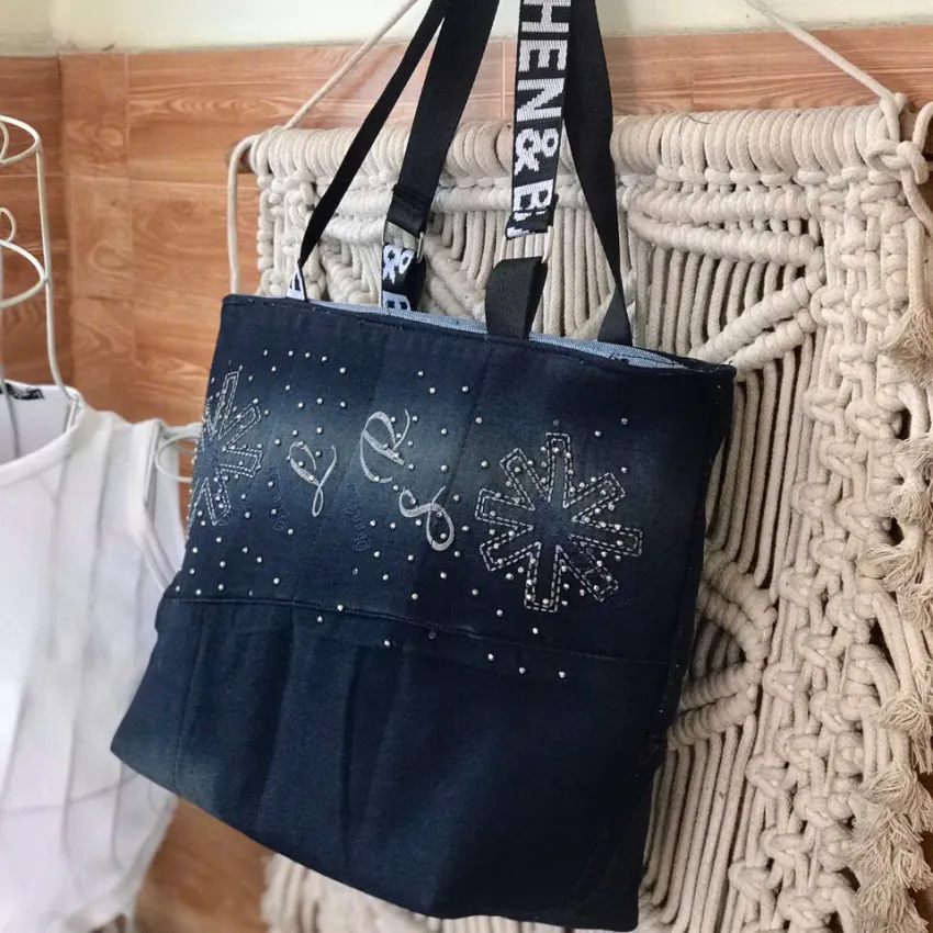 Bling tote bag from old jeans serves as a sustainable fashion accessory that helps you shine everywhere, transforming recycled materials into a convenient handbag that makes a unique and meaningful birthday gift Bling tote bag from old jeans serves as a sustainable fashion accessory that helps you shine everywhere, transforming recycled materials into a convenient handbag that makes a unique and meaningful birthday gift