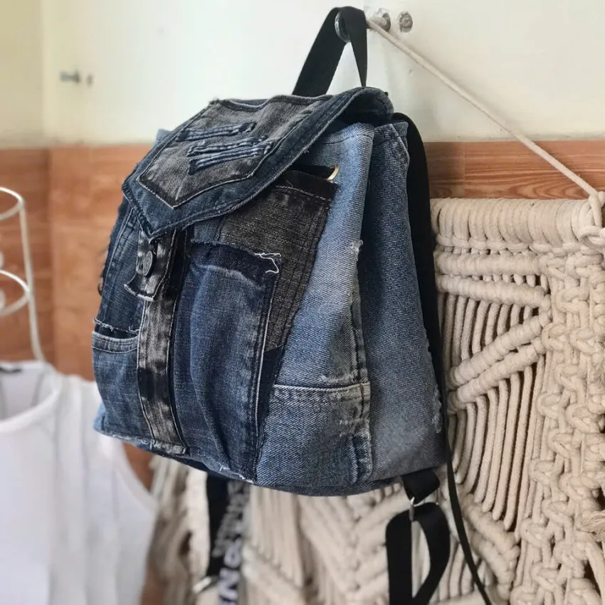 Flap mini backpack crafted from old jeans offers exclusive one-off design just for you, combining upcycled fashion sensibility with distinctive denim style as creative birthday gift and meaningful eco-friendly present. Flap mini backpack crafted from old jeans offers exclusive one-off design just for you, combining upcycled fashion sensibility with distinctive denim style as creative birthday gift and meaningful eco-friendly present.