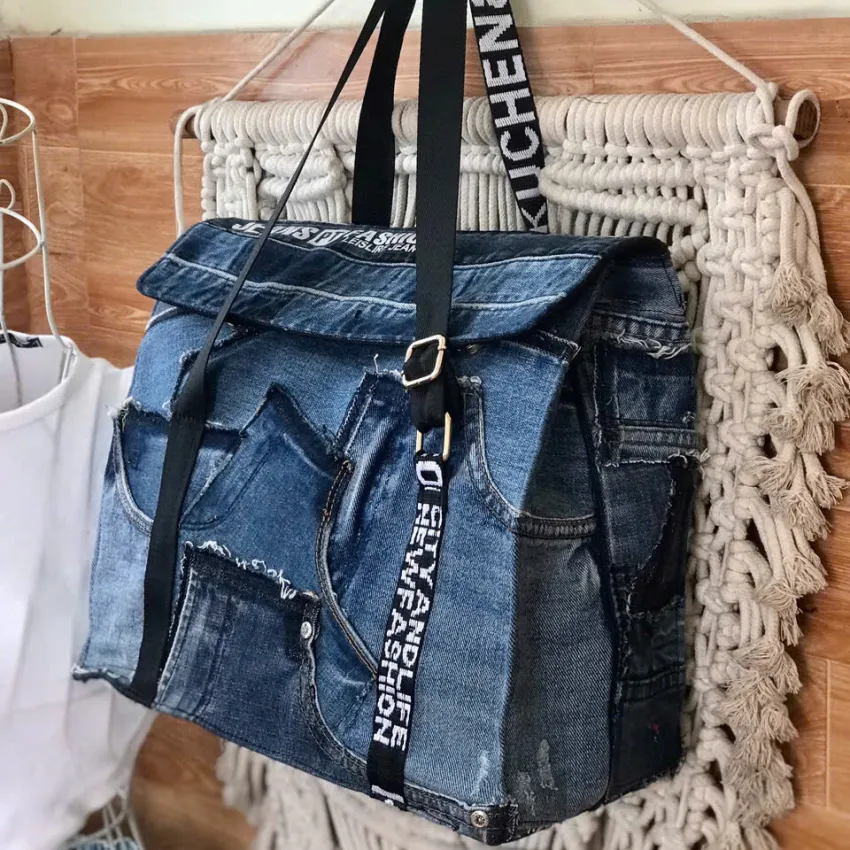 Patchwork flap tote bag from old jeans creates impressive shapes in any space while embodying sustainable fashion principles in a unique accessory that makes for a thoughtful handmade gift Patchwork flap tote bag from old jeans creates impressive shapes in any space while embodying sustainable fashion principles in a unique accessory that makes for a thoughtful handmade gift