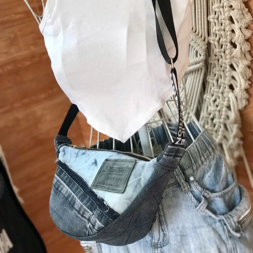Contrast crossbody bag from old jeans where uniqueness and eco-friendliness take the throne, creating an upcycled accessory and unique birthday gift for sustainable fashion lovers. Contrast crossbody bag from old jeans where uniqueness and eco-friendliness take the throne, creating an upcycled accessory and unique birthday gift for sustainable fashion lovers.
