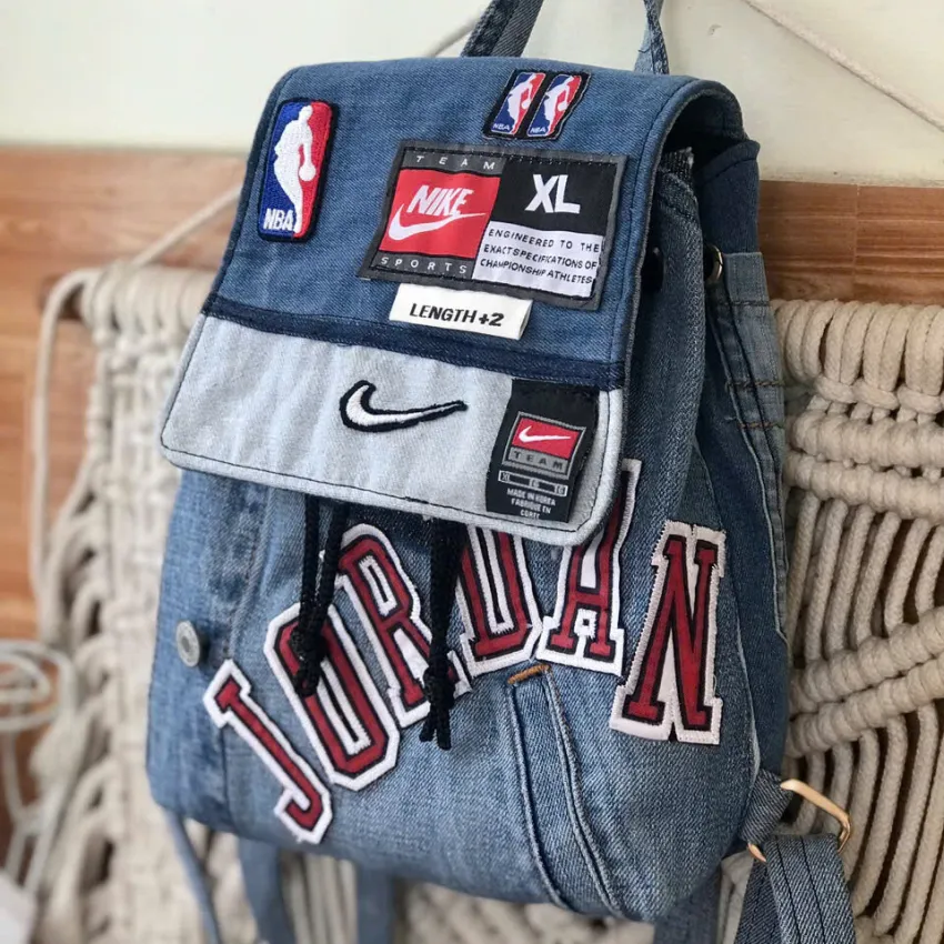 Mini Jordans backpack showcasing personality through every patchwork detail, handcrafted from upcycled old jeans as a unique fashion statement and memorable birthday gift. Mini Jordans backpack showcasing personality through every patchwork detail, handcrafted from upcycled old jeans as a unique fashion statement and memorable birthday gift.