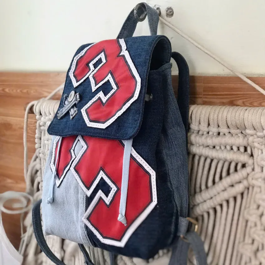 Mini number 3 backpack from old jeans is the perfect way to express personal style, a unique sustainable fashion accessory and creative birthday gift. Mini number 3 backpack from old jeans is the perfect way to express personal style, a unique sustainable fashion accessory and creative birthday gift.